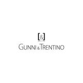 Logotipo de Gunni & Trentino en blanco sobre fondo negro