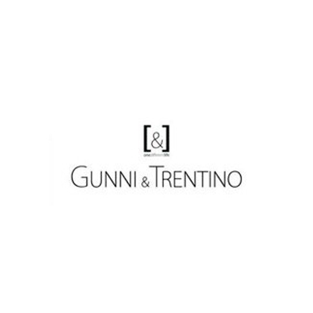 Logotipo de Gunni & Trentino en blanco sobre fondo negro