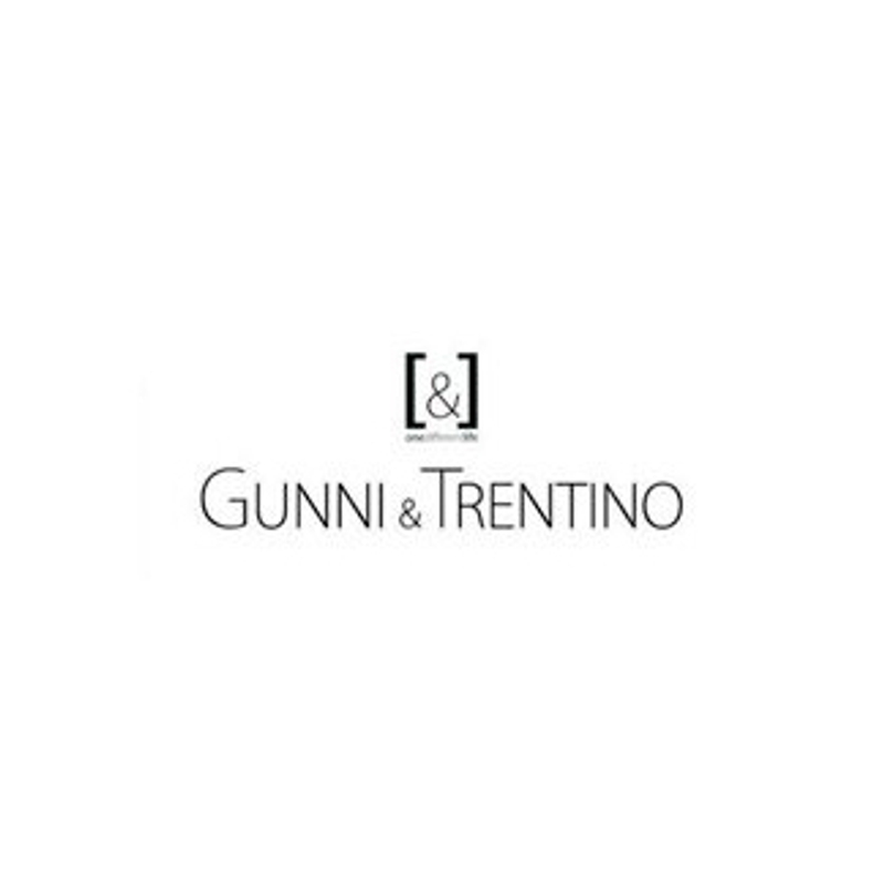 Logotipo de Gunni & Trentino en blanco sobre fondo negro